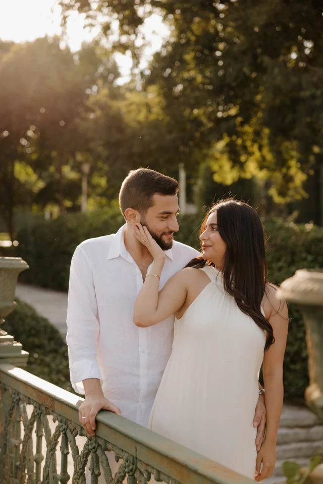 Natalie and Abdulrahman close together in warm golden light